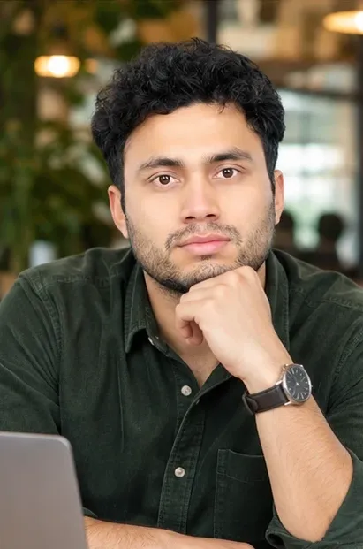 Prakash Nepali working at a laptop